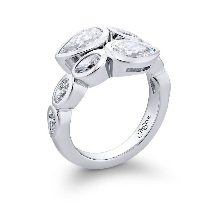 Dazzling Brilliance: Our unique 1.42 ctw. GIA certified Bezel Twogether Diamond Ring. These stunning pear-shaped diamonds accompanied by oval and pear-shaped diamonds are handcrafted in pure platinum.