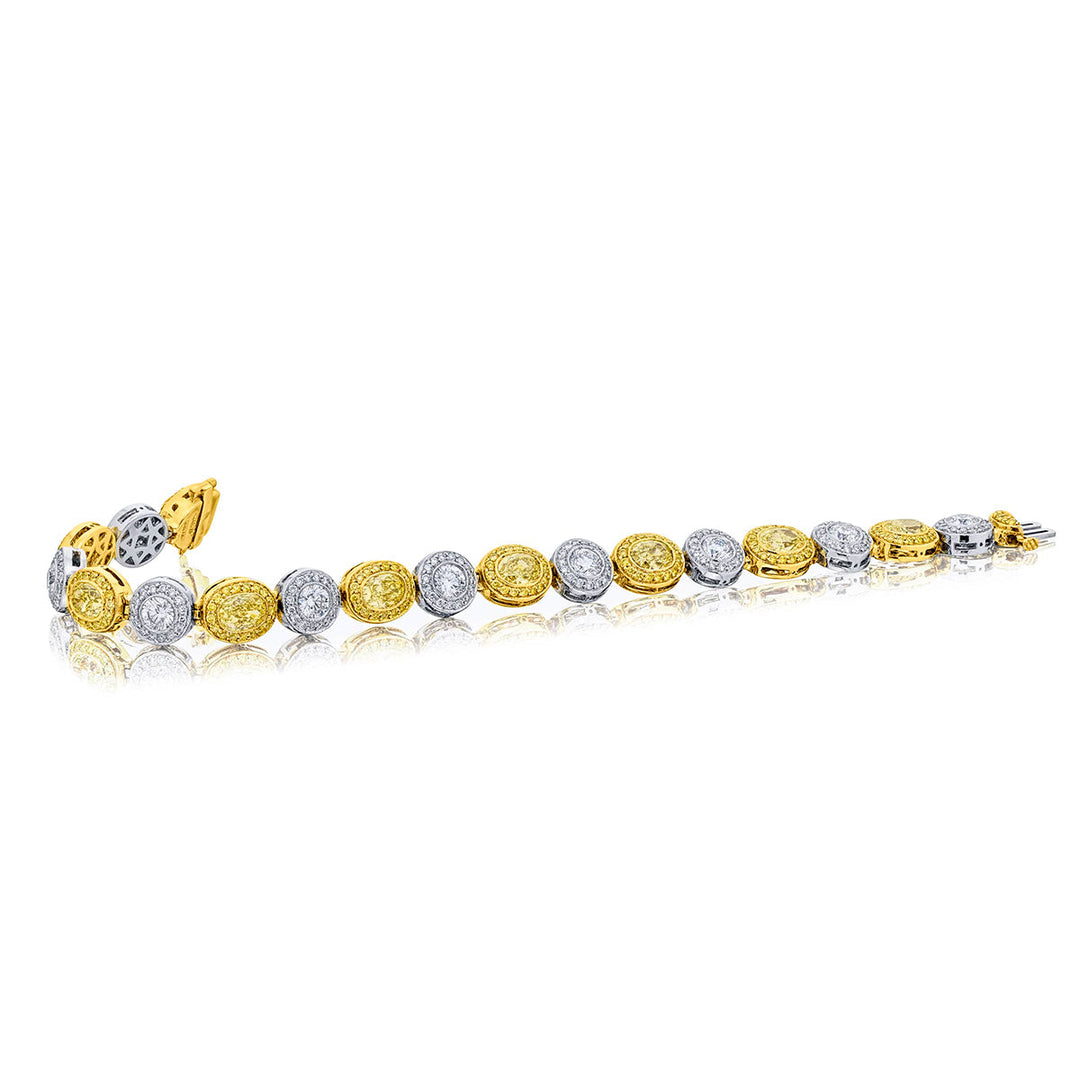Platinum and 18K Yellow Gold Oval and Round Micro Pave Bracelet