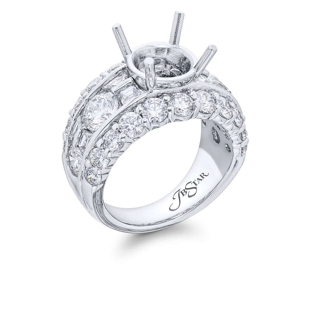 Gorgeous wided iamond semi mount featuring round diamonds and tapered baguette diamonds in a center channel and edged in round diamond pave. Handcrafted in pure platinum.