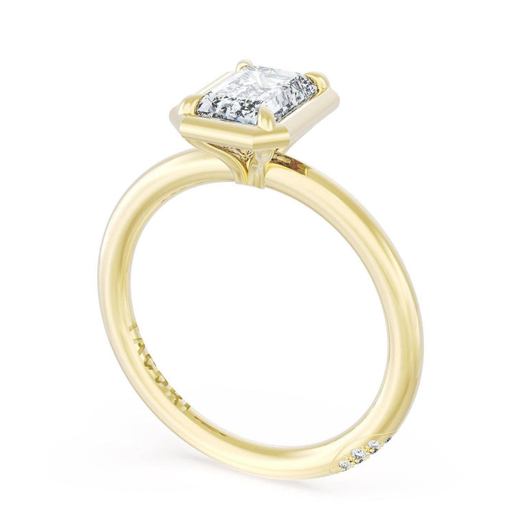 Emerald Solitaire Engagement Ring