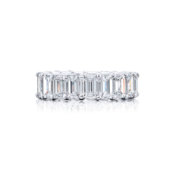 Alluring Eternity: Our beautiful single-row GIA certified Diamond Eternity Band. These nineteen emerald-cut diamonds are handcrafted in pure platinum.