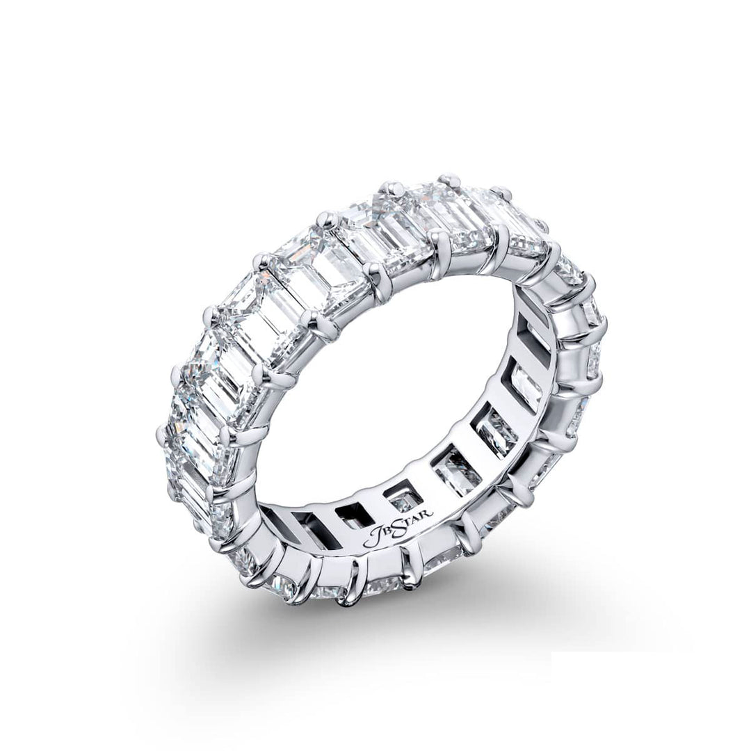 Alluring Eternity: Our beautiful single-row GIA certified Diamond Eternity Band. These nineteen emerald-cut diamonds are handcrafted in pure platinum.