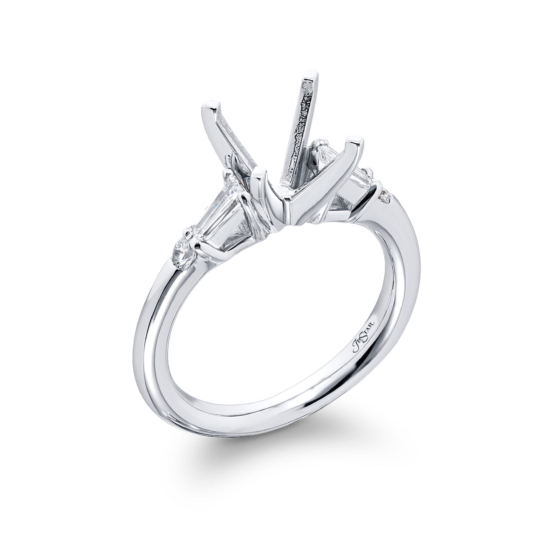 Dazzling Brilliance: Our timeless Diamond Semi-mount. These two beautiful tapered baguette diamonds and two dazzling round diamonds are handcrafted in pure platinum.