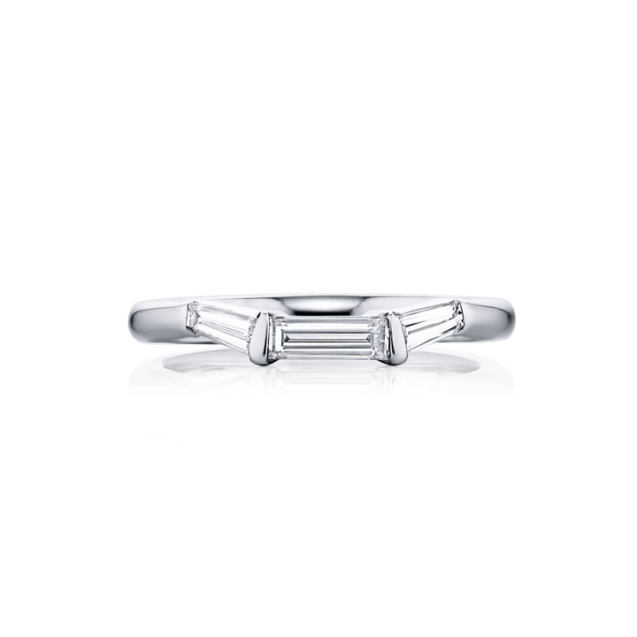 Elegance Elevated: Our classic East-West Channel Set Diamond Band. This beautiful straight-cut diamond blended with dazzling tapered baguette diamonds are handcrafted in pure platinum.