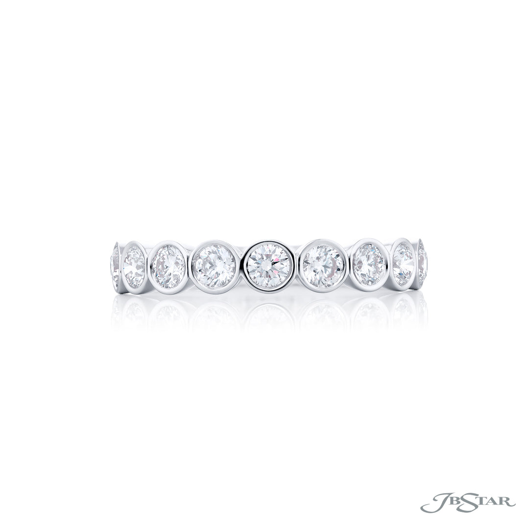Elegance Elevated: Our stunning Bezel Diamond Band. These nine beautiful round diamonds are handcrafted in pure platinum.