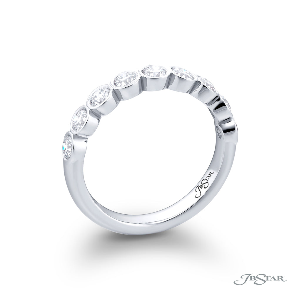 Elegance Elevated: Our stunning Bezel Diamond Band. These nine beautiful round diamonds are handcrafted in pure platinum.