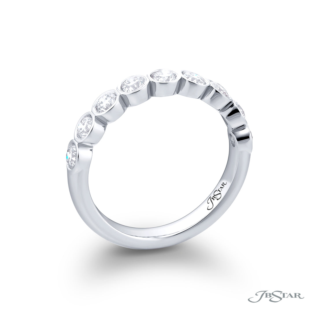 Elegance Elevated: Our stunning Bezel Diamond Band. These nine beautiful round diamonds are handcrafted in pure platinum.