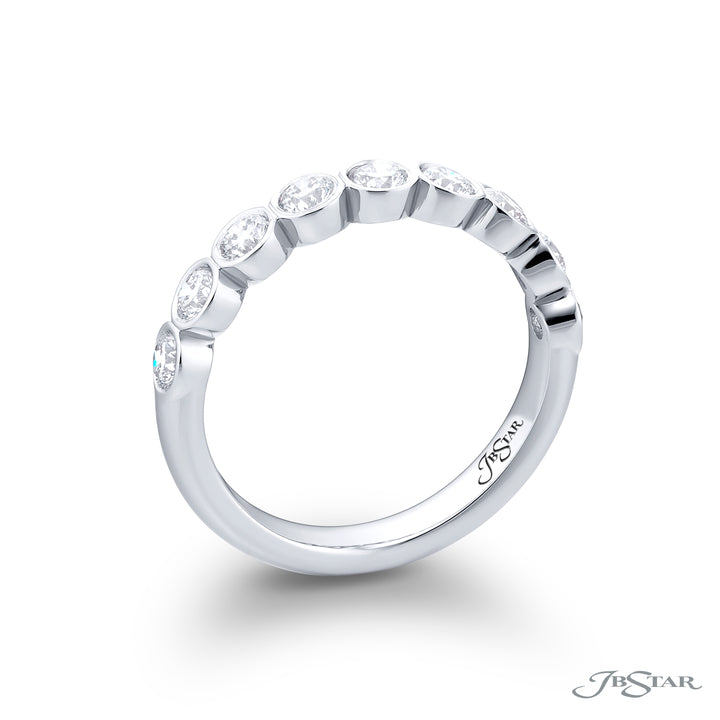 Elegance Elevated: Our stunning Bezel Diamond Band. These nine beautiful round diamonds are handcrafted in pure platinum.