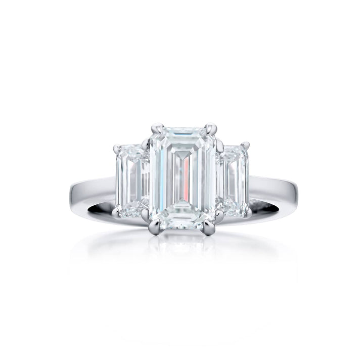 Dazzling Brilliance: Our timeless 1.51 ct. GIA certified Diamond Ring. This gorgeous emerald-cut diamond flanked by matching emerald-cut diamonds is handcrafted in pure platinum.