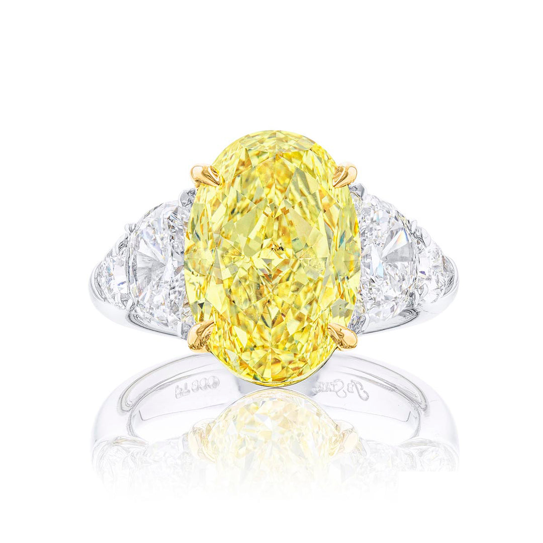 7.53 ct. Fancy Intense Yellow Oval Diamond Ring with Half-Moon & Shield Side Stones