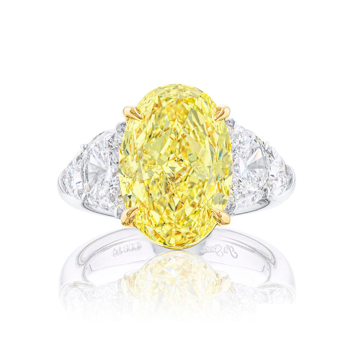 7.53 ct. Fancy Intense Yellow Oval Diamond Ring with Half-Moon & Shield Side Stones