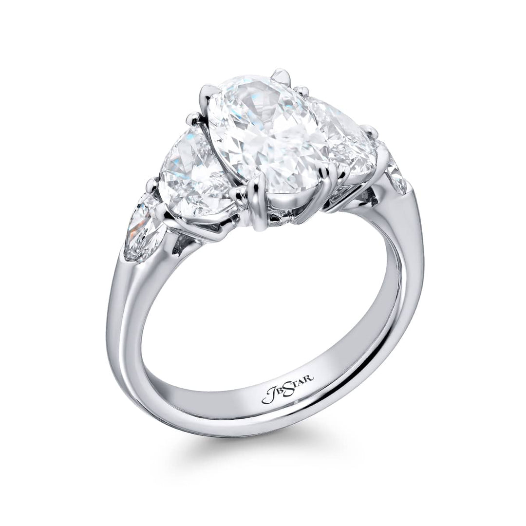 Dazzling Brilliance: Our timeless 2.01 ct. GIA certified Diamond Ring. This gorgeous oval diamond flanked by half-moon and shield diamonds is handcrafted in pure platinum.