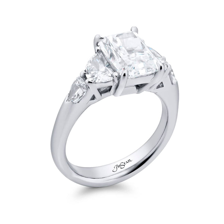 Dazzling Brilliance: Our timeless 2.50 ct. GIA certified Diamond Ring. This gorgeous radiant-cut diamond flanked by shield and half-moon diamonds is handcrafted in pure platinum.