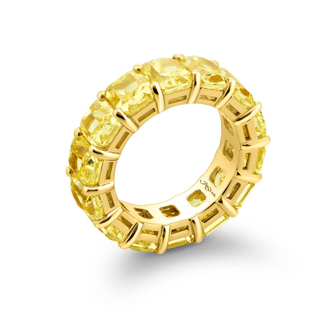 Alluring Eternity: Our magnificent 14.37 ctw. GIA certified Fancy Yellow Diamond Eternity Band. These fourteen dazzling radiant-cut fancy yellow diamonds are handcrafted in 18KY gold.