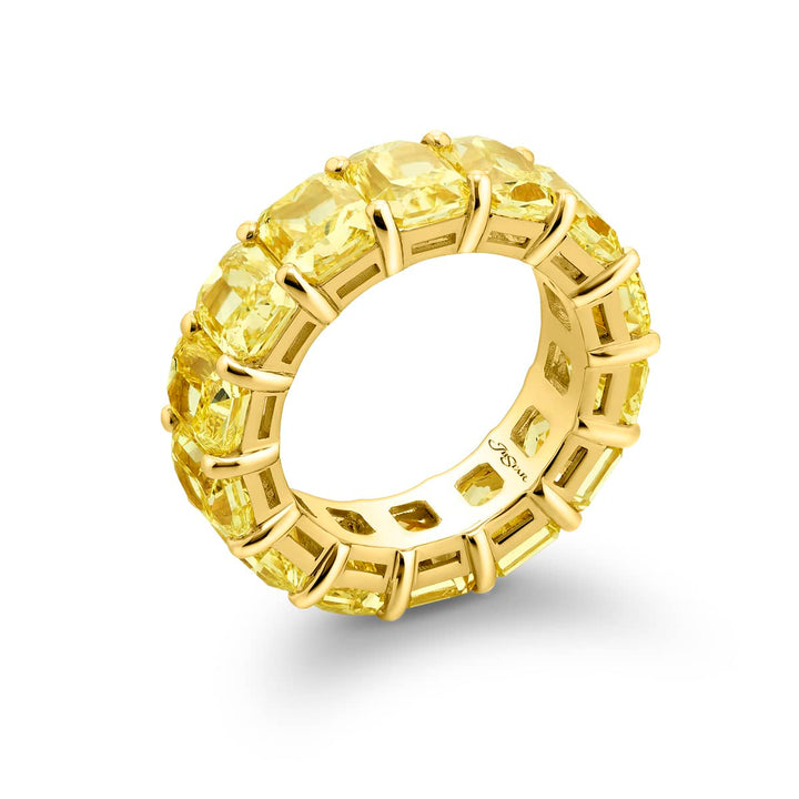 Alluring Eternity: Our magnificent 14.37 ctw. GIA certified Fancy Yellow Diamond Eternity Band. These fourteen dazzling radiant-cut fancy yellow diamonds are handcrafted in 18KY gold.