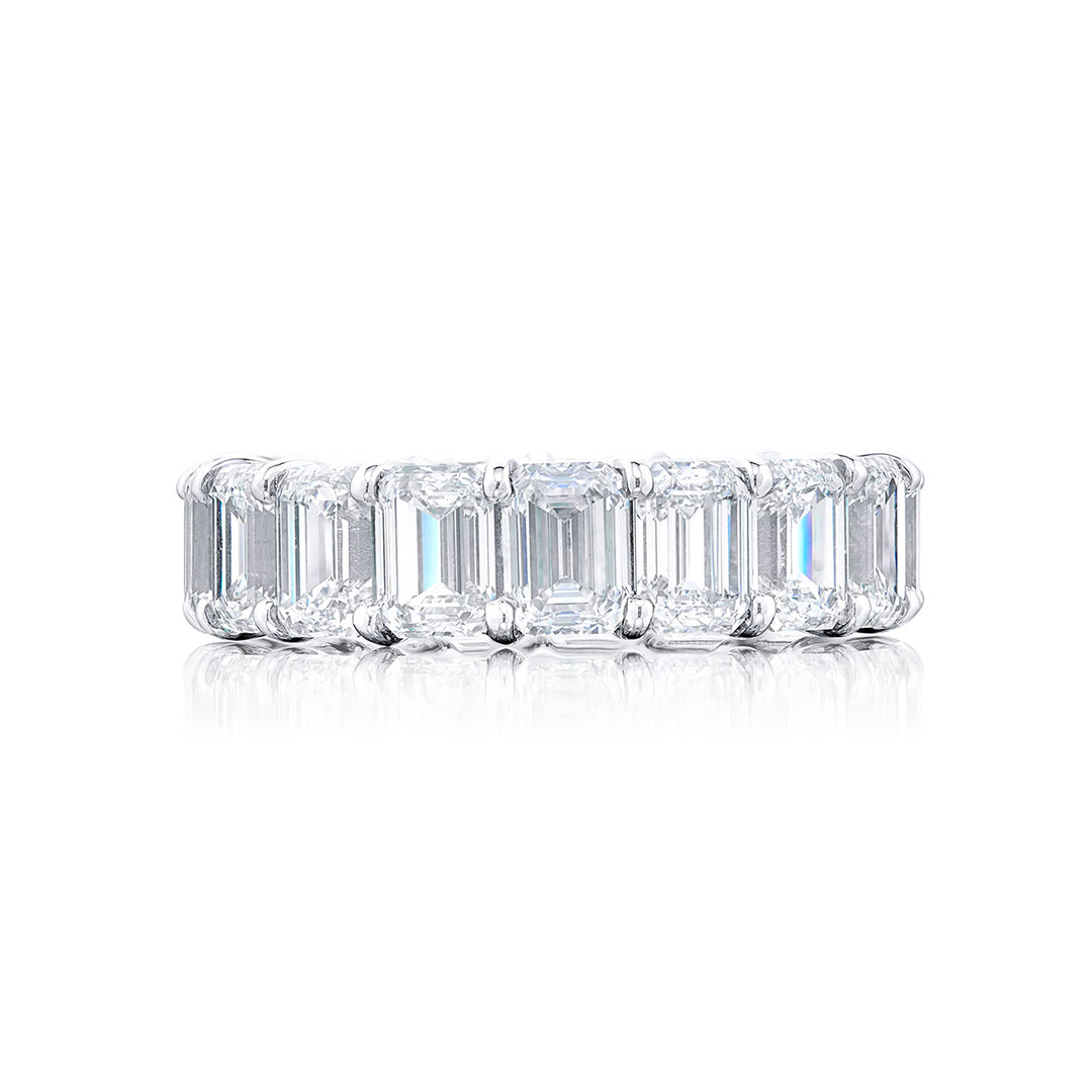 Alluring Eternity: Our beautiful single-row Diamond Eternity Band. This seventeen emerald-cut diamond ring is handcrafted in pure platinum.