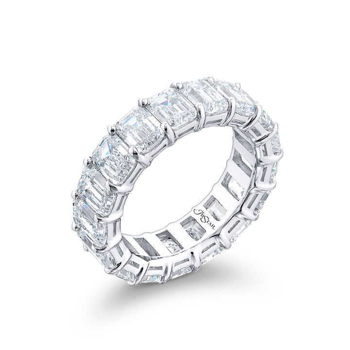 Alluring Eternity: Our beautiful single-row Diamond Eternity Band. This seventeen emerald-cut diamond ring is handcrafted in pure platinum.