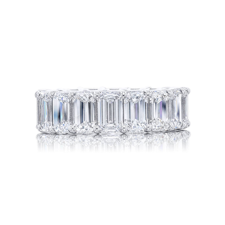 Beautiful eternity band featuring 18 emerald-cut diamonds in a shared prong setting. Handcrafted in pure platinum.
