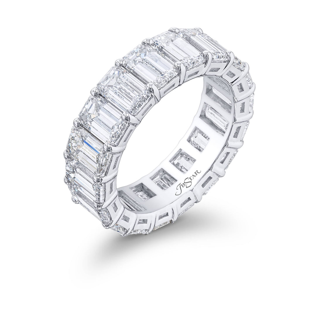 Beautiful eternity band featuring 18 emerald-cut diamonds in a shared prong setting. Handcrafted in pure platinum.