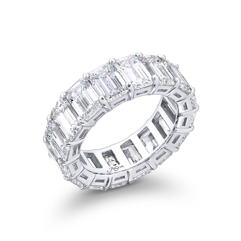 Alluring Eternity: Our beautiful single row certified diamond eternity band. These 16 perfectly matched emerald-cut diamonds are set in a shared prong and are meticulously handcrafted in pure platinum.