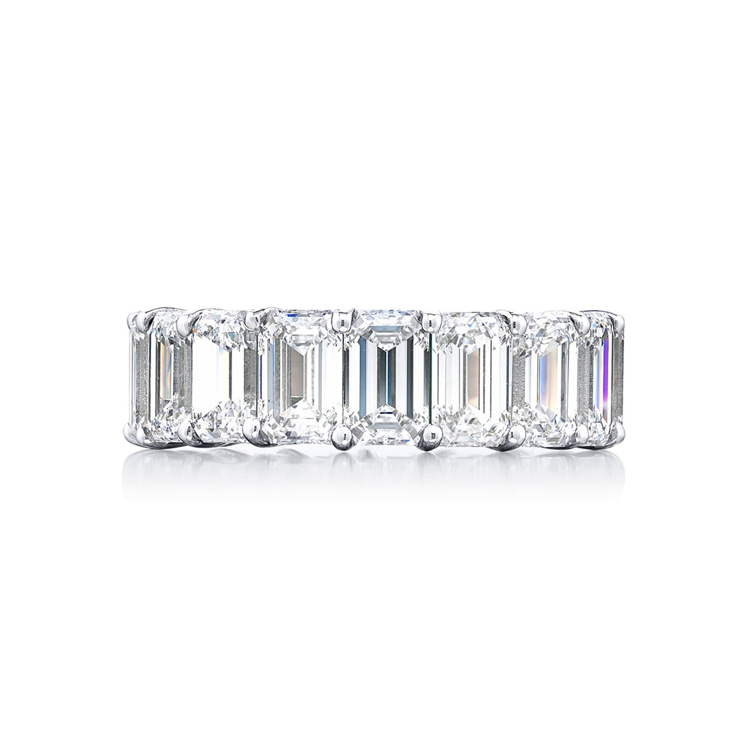Beautiful eternity band featuring 17 GIA certified emerald-cut diamonds in a shared prong setting. Handcrafted in pure platinum.