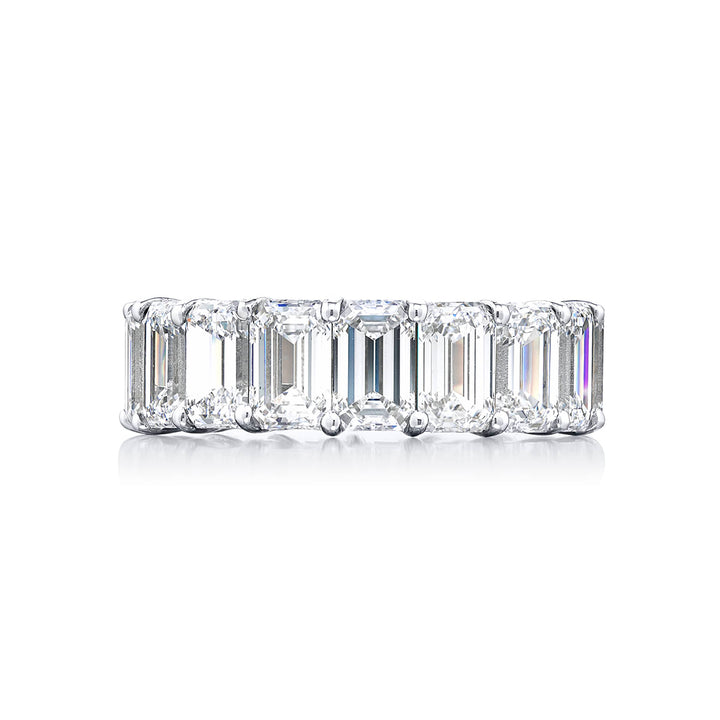 Beautiful eternity band featuring 17 GIA certified emerald-cut diamonds in a shared prong setting. Handcrafted in pure platinum.