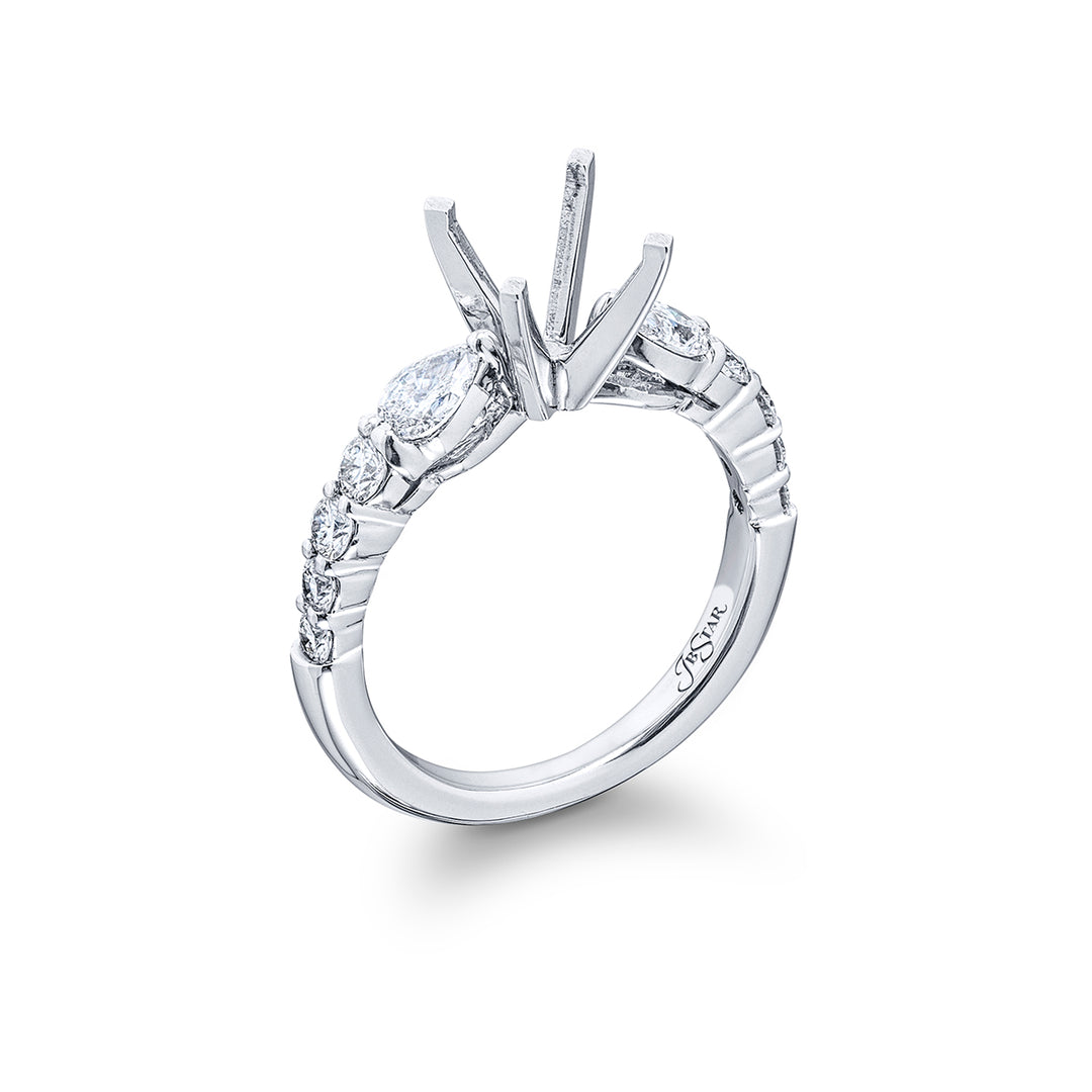 Dazzling Brilliance: Our timeless Diamond Semi-mount. These two pear-shaped diamonds accompanied by eight beautiful round diamonds are handcrafted in pure platinum.