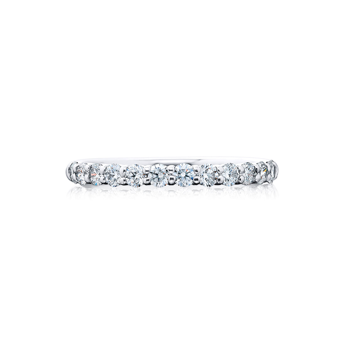 Elegance Elevated: Our stunning 0.67 ctw. Diamond Band. These thirteen beautiful round diamonds are handcrafted in  pure platinum.