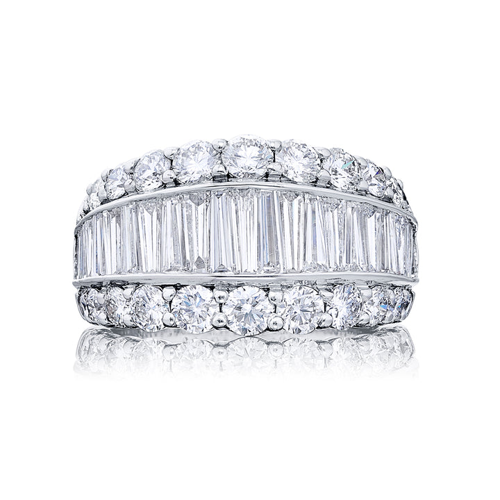 Elegance Elevated: Our classic Channel Diamond Band. These twenty-three beautiful straight baguette diamonds embraced by round diamonds are handcrafted in pure platinum.