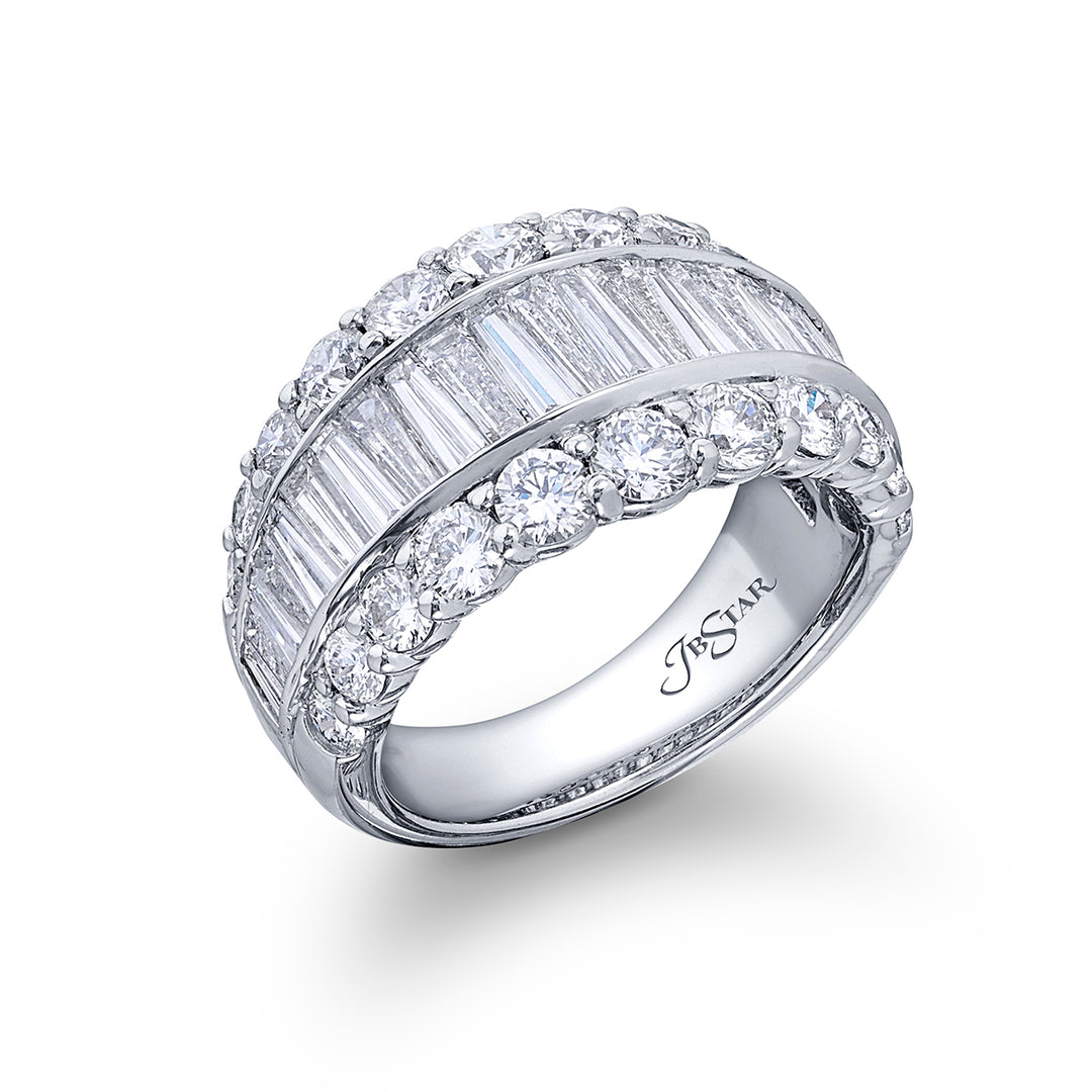 Elegance Elevated: Our classic Channel Diamond Band. These twenty-three beautiful straight baguette diamonds embraced by round diamonds are handcrafted in pure platinum.