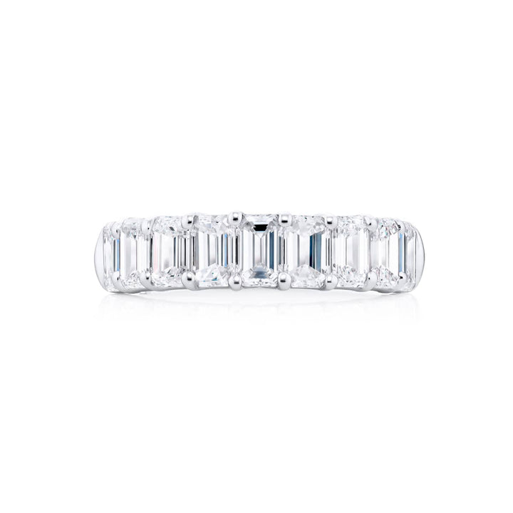 Elegance Elevated: Our signature 2.71 ctw. Diamond Band. These nine gorgeous emerald-cut diamonds are handcrafted in pure platinum.