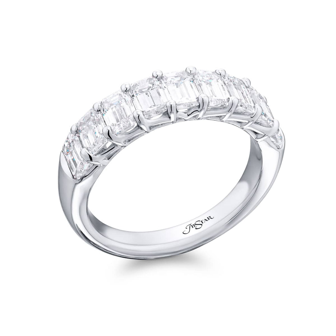 Elegance Elevated: Our signature 2.71 ctw. Diamond Band. These nine gorgeous emerald-cut diamonds are handcrafted in pure platinum.
