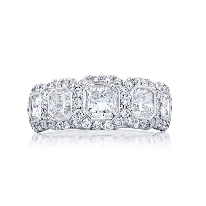 Elegance Elevated: Our stunning 2.22 ctw. Bezel Diamond Band. These beautiful radiant-cut diamonds blended with round diamonds are handcrafted in pure platinum.