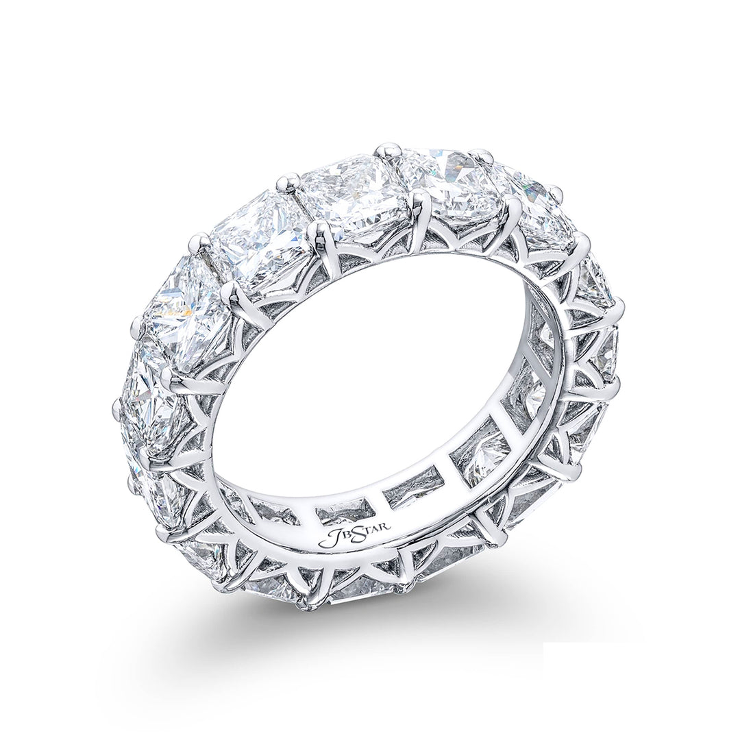 An exquisite eternity band meticulously handcrafted in pure platinum showcasing 15 impeccably matched radiant-cut diamonds set within a shared prong arrangement radiating timeless beauty.