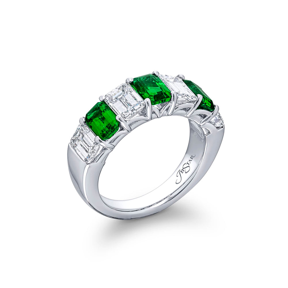 Gorgeous emerald and diamond wedding band featuring 4 perfectly matched emerald-cut diamonds and 3 emerald-cut emeralds in a shared prong setting. Handcrafted in pure platinum.