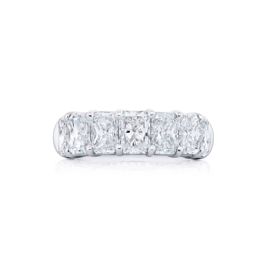 Elegance Elevated: Our stunning 4.26 ctw. GIA certified Diamond Band. These seven beautiful radiant-cut diamonds are handcrafted in pure platinum.
