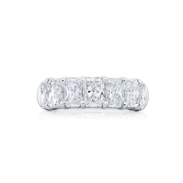 Elegance Elevated: Our stunning 4.26 ctw. GIA certified Diamond Band. These seven beautiful radiant-cut diamonds are handcrafted in pure platinum.