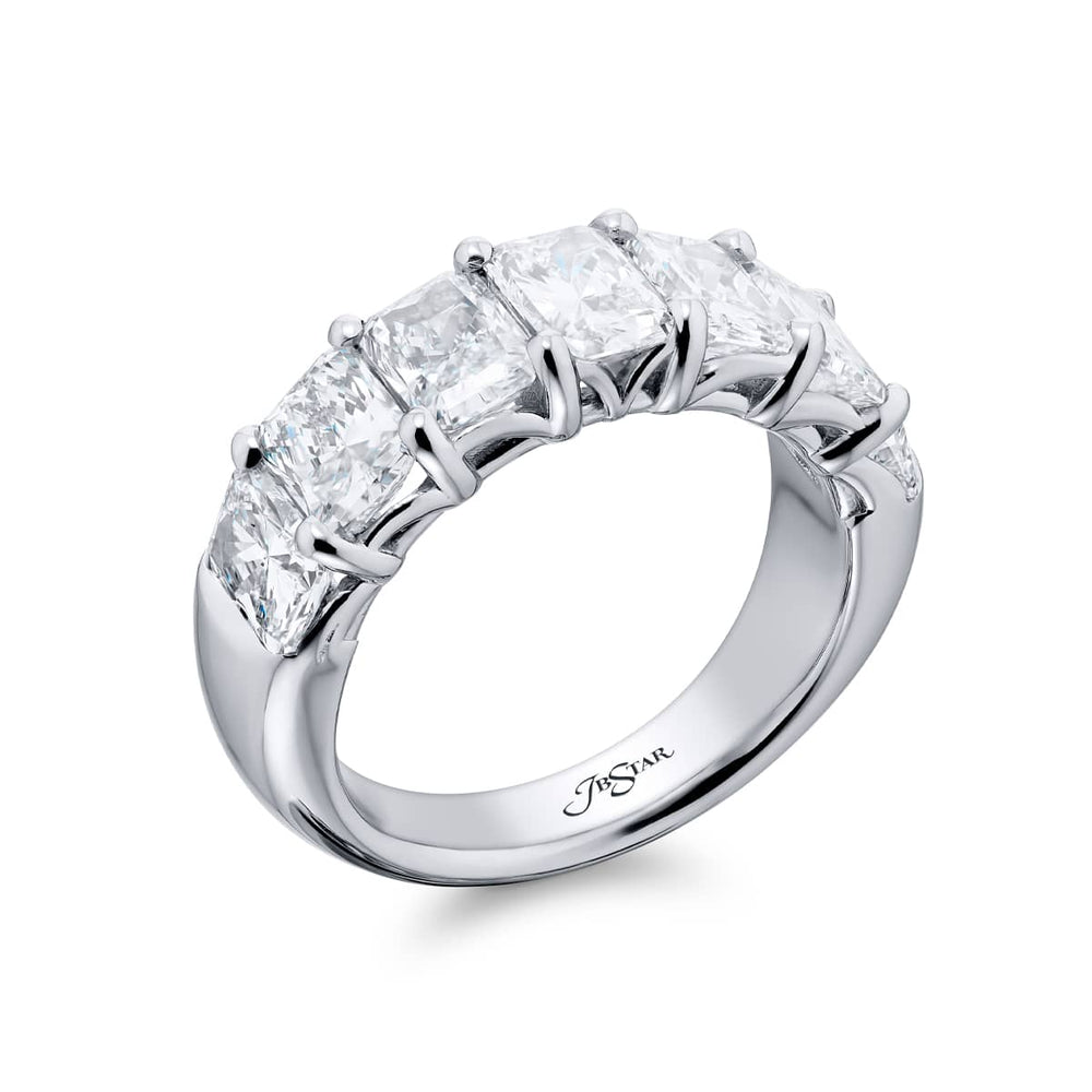 Elegance Elevated: Our stunning 4.26 ctw. GIA certified Diamond Band. These seven beautiful radiant-cut diamonds are handcrafted in pure platinum.