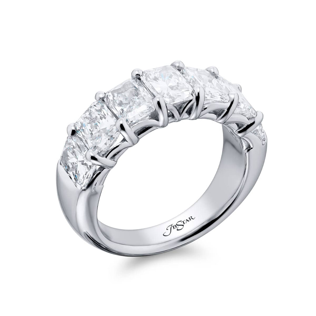 Elegance Elevated: Our stunning 4.26 ctw. GIA certified Diamond Band. These seven beautiful radiant-cut diamonds are handcrafted in pure platinum.