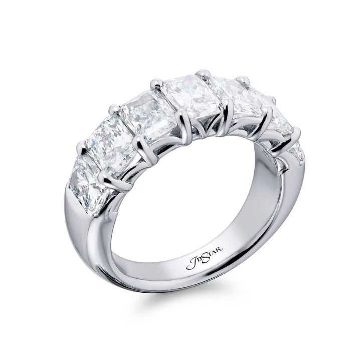 Elegance Elevated: Our stunning 4.26 ctw. GIA certified Diamond Band. These seven beautiful radiant-cut diamonds are handcrafted in pure platinum.