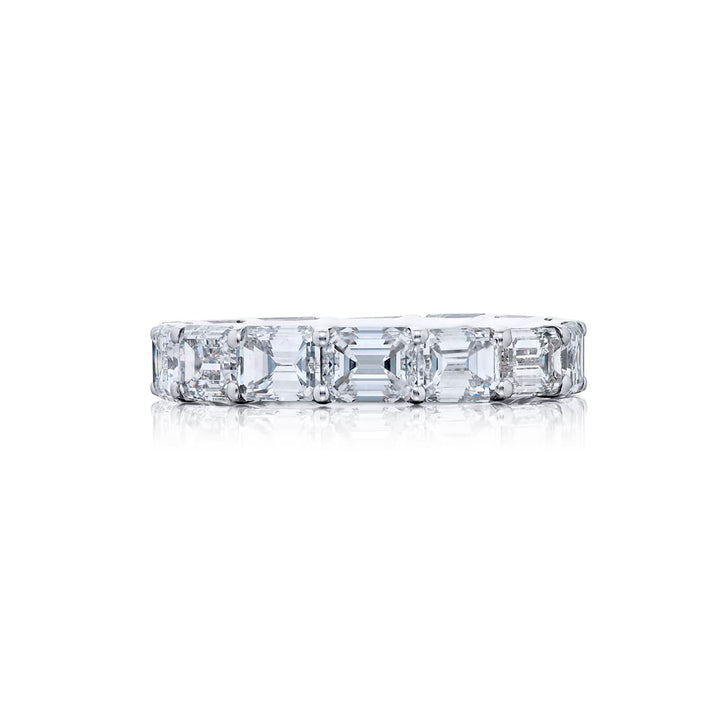 Alluring Eternity: Our stunning single row East-West Diamond Eternity Band. These fourteen emerald-cut diamonds are handcrafted in pure platinum.