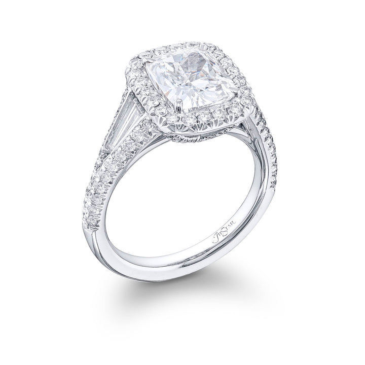 Dazzling diamond engagement ring featuring a 2.55 ct. cushion-cut diamond center embraced by tapered baguette in a micro pave setting. Handcrafted in pure platinum.