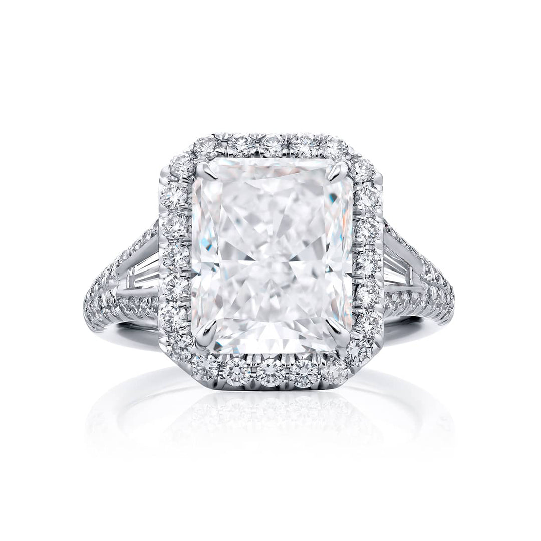 Dazzling Brilliance: Our timeless 4.53 ct. GIA certified Diamond Ring. This beautiful radiant-cut diamond cradled in tapered baguette and micro pave diamonds is handcrafted in pure platinum.