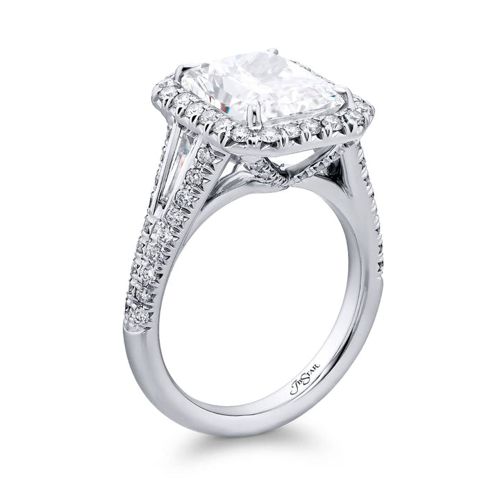 Dazzling Brilliance: Our timeless 4.53 ct. GIA certified Diamond Ring. This beautiful radiant-cut diamond cradled in tapered baguette and micro pave diamonds is handcrafted in pure platinum.
