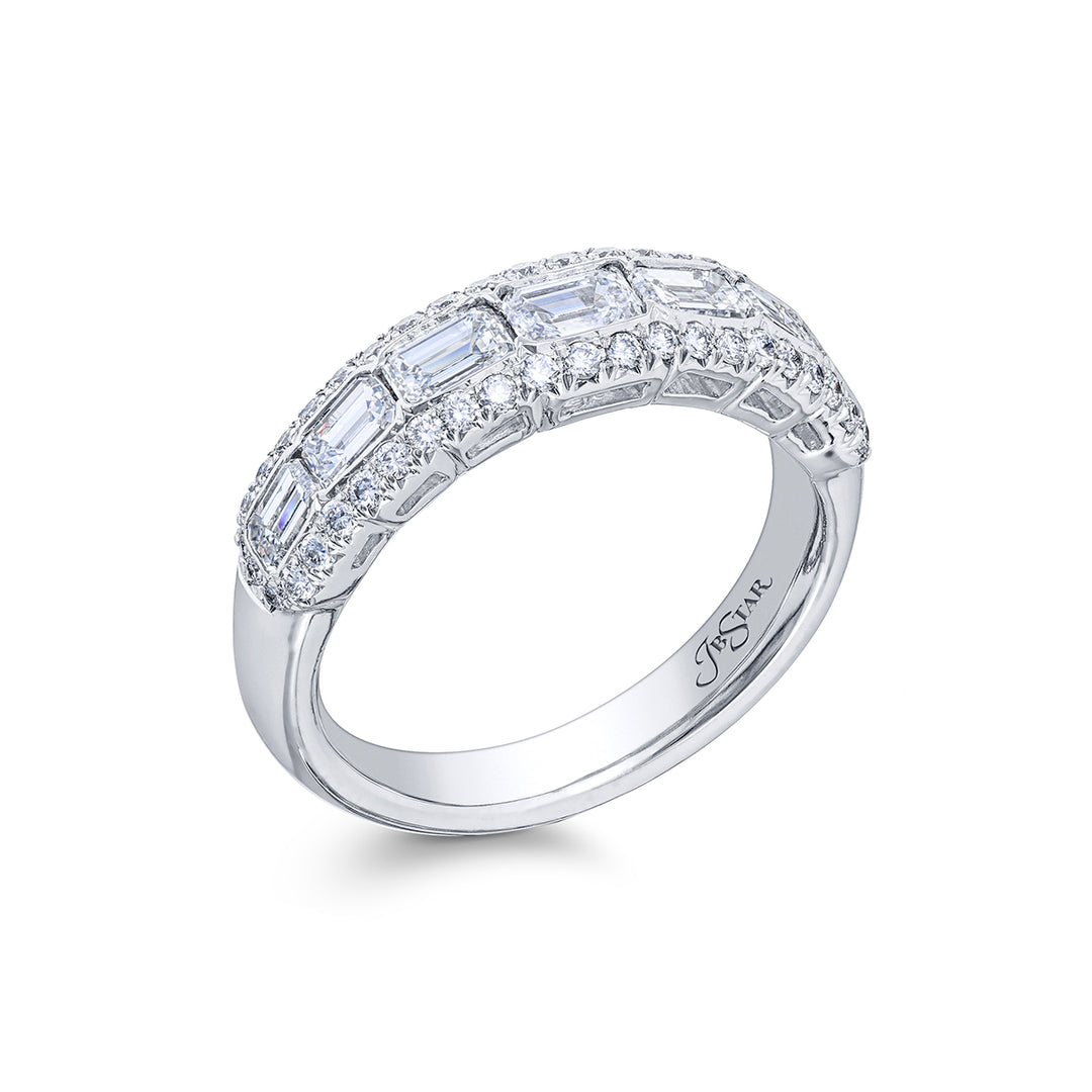 Elegance Elevated: Our signature East-West Channel Diamond Band. These gorgeous seven emerald-cut diamonds embraced by micro pave diamonds are handcrafted in pure platinum.