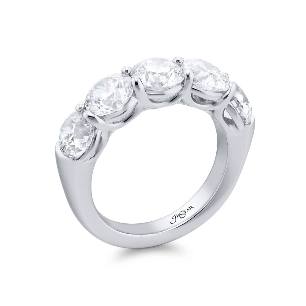 Elegance Elevated: Our stunning 4.50 ctw. GIA certified Diamond Band. These five beautiful round diamonds are handcrafted in pure platinum.