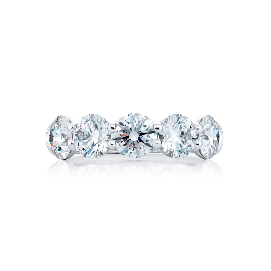 Elegance Elevated: Our stunning 2.71 ctw. Diamond Band. These five beautiful round diamonds are handcrafted in pure platinum.