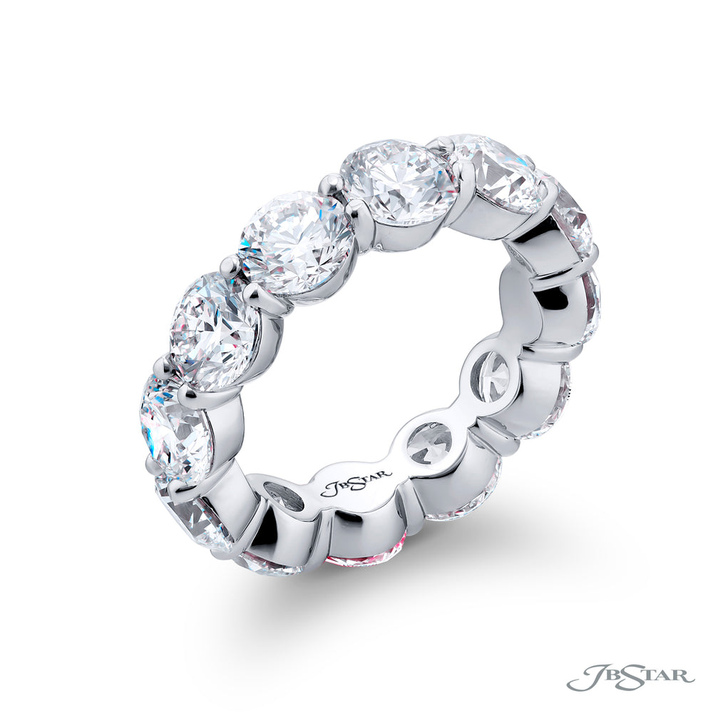 Dazzling diamond eternity band GIA certified featuring 12 beautifully matched round diamonds in a shared prong setting. Handcrafted in platinum.