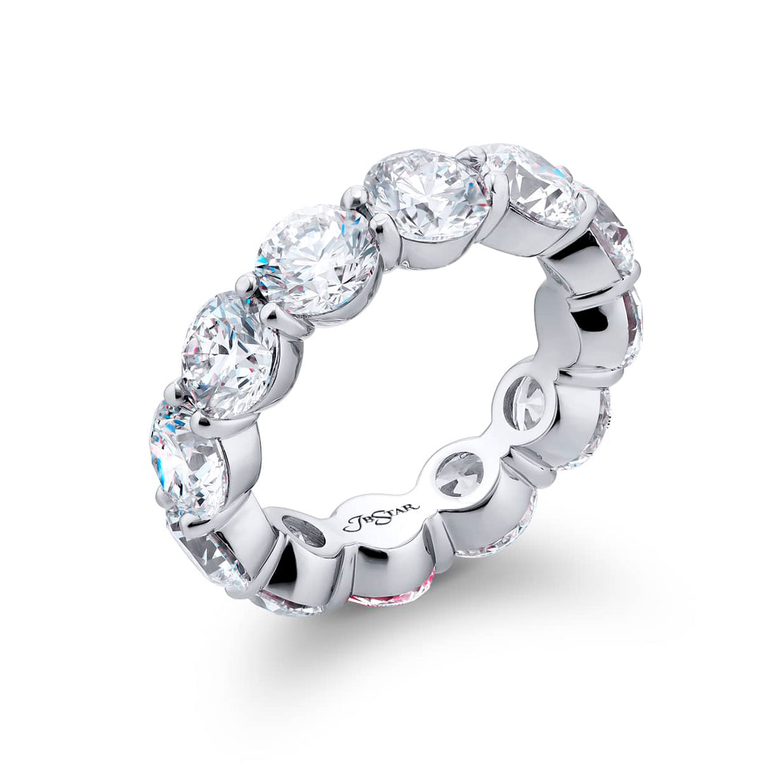 Alluring Eternity: Our magnificent 8.42 ctw. GIA certified Diamond Eternity Band. These twelve stunning round diamonds are handcrafted in pure platinum.