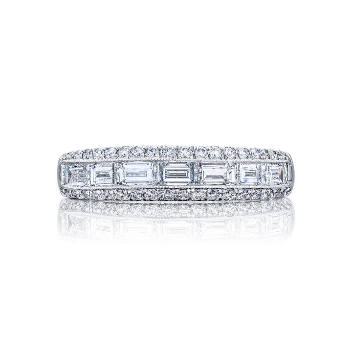 Elegance Elevated: Our signature East-West Channel Diamond Band. These gorgeous seven straight baguette diamonds embraced by micro pave diamonds are handcrafted in pure platinum.